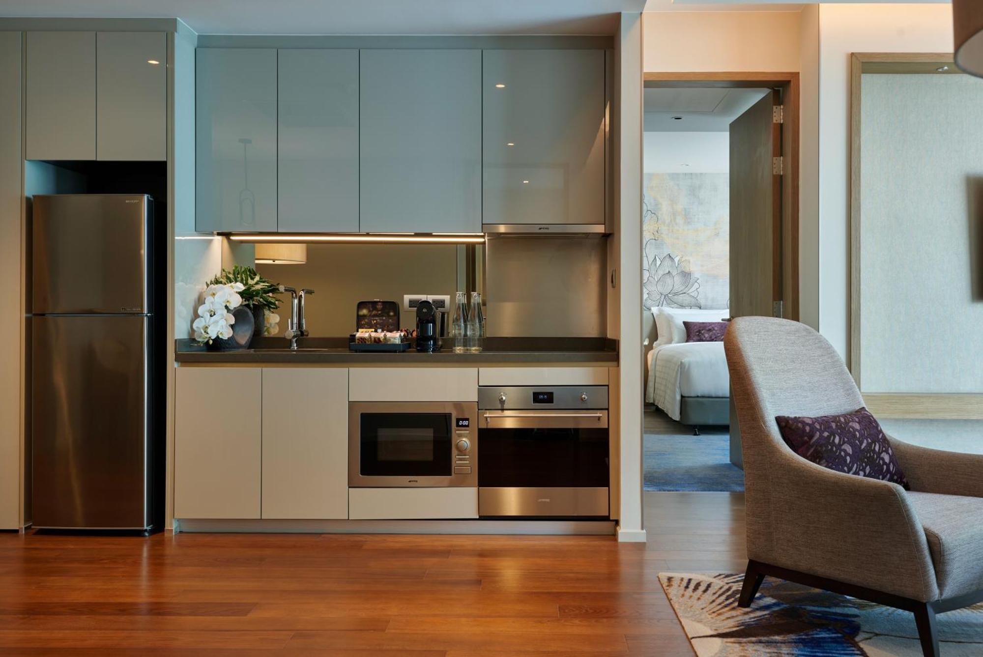 Chatrium Grand Bangkok Dış mekan fotoğraf A kitchen in a serviced apartment