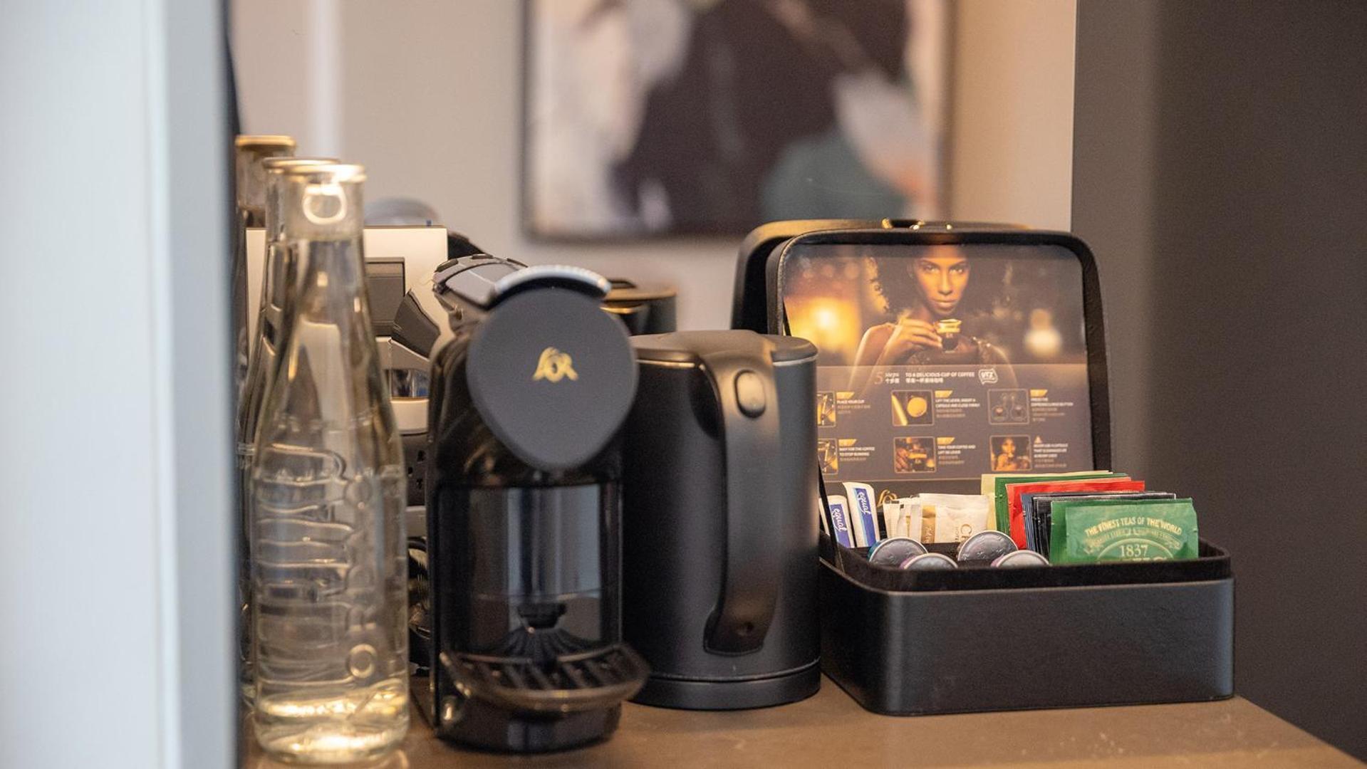 Chatrium Grand Bangkok Dış mekan fotoğraf A Nespresso coffee machine